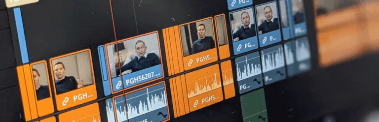 Editing timeline, orange and blue clips to help the editor ID clips on long form productions