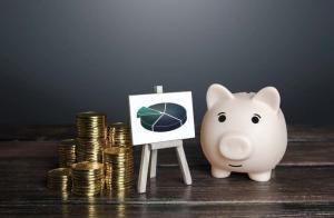 Coins and a piggybank illustrating video production cost