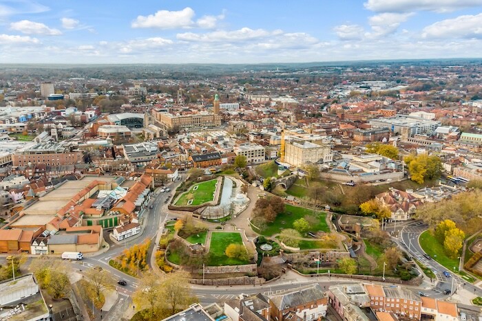 Aerial drone videography over Norwich city, showing the city castle