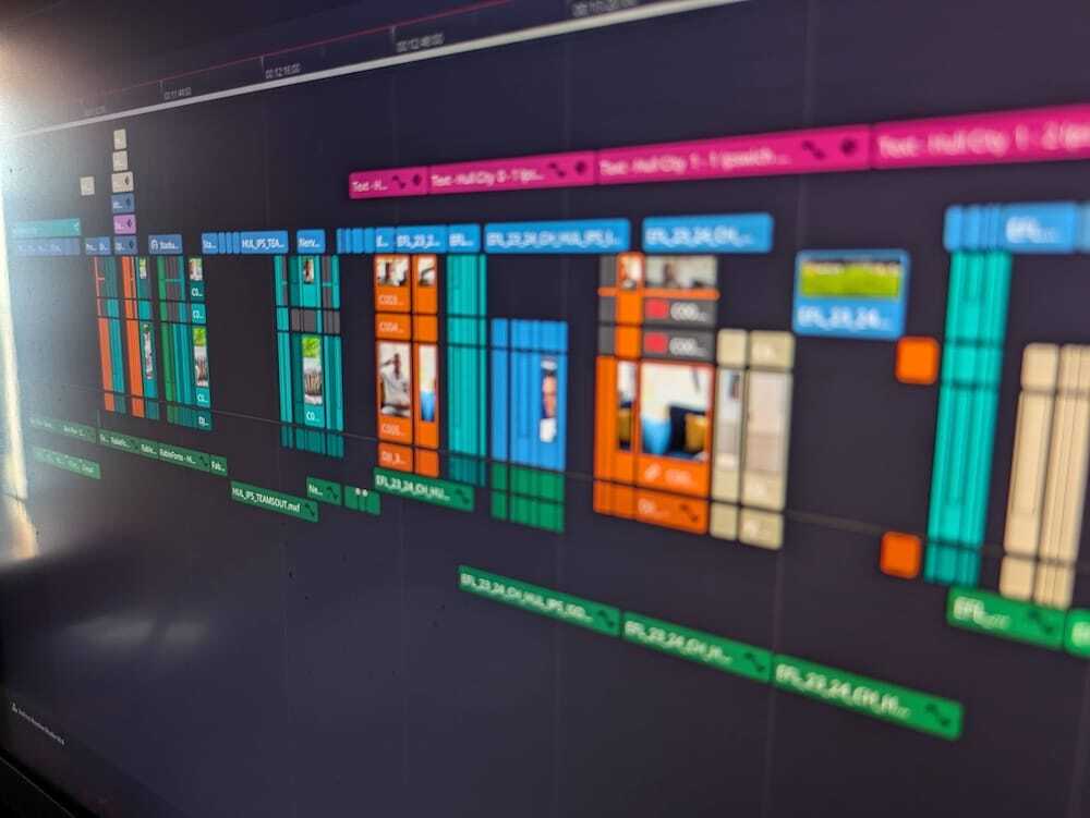 Video editors monitor showing the video edit timeline of a Norfolk project. It's a colourful timeline to aid working.