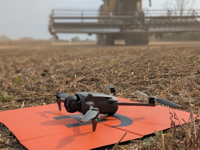 mavic 4 pro drone on landing mat in bury st edmunds field. Sunny day.